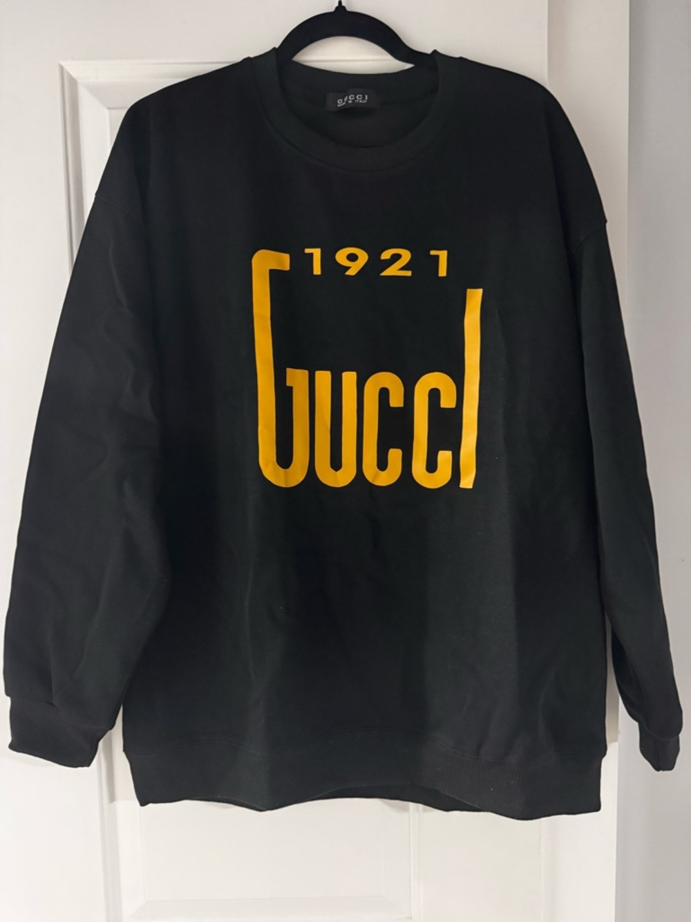 Black Crewneck Sweatshirt with Yellow Logo